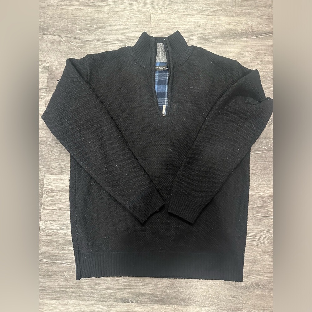 Black and Blue quarter zip sweatshirt.